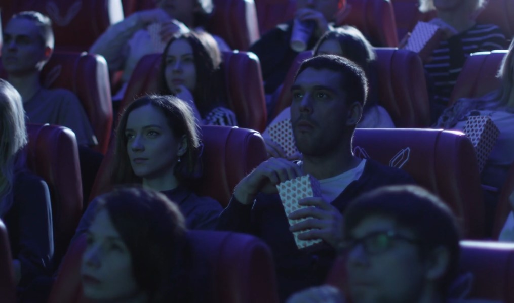 People watching movie in cinema