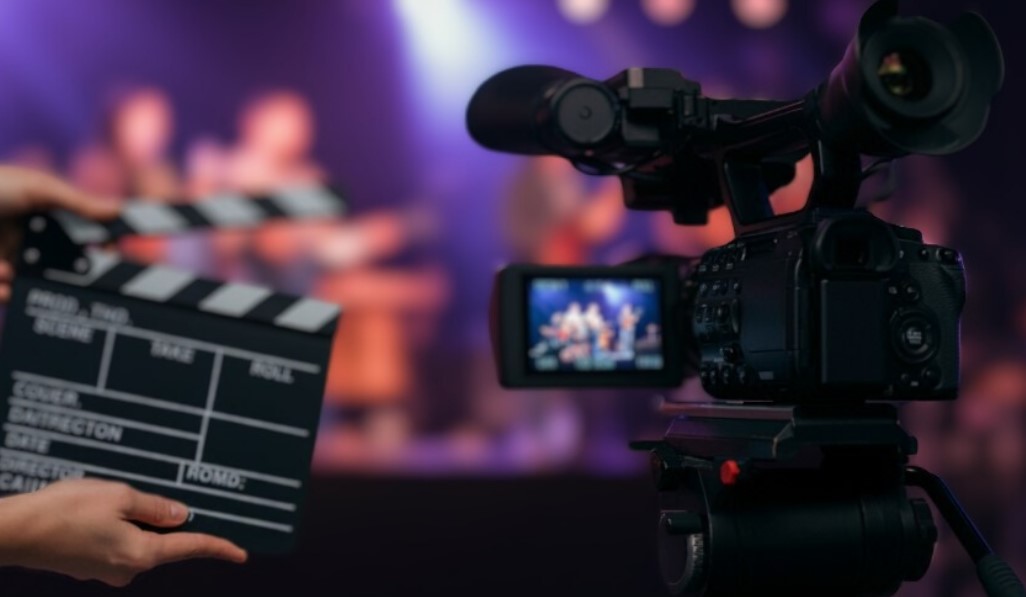 Camera and clap board on a film set