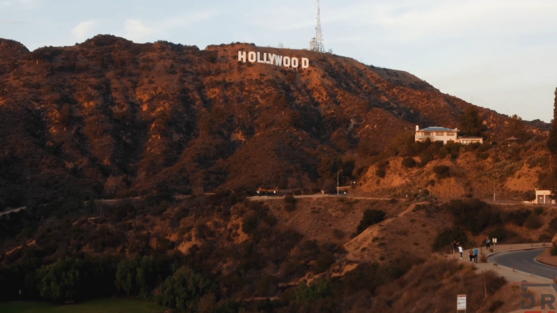 A Scenic View of The Hollywood Hills with The Iconic "Hollywood" Sign in The Background