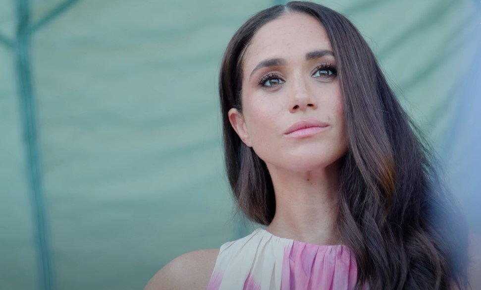 Meghan Markle posing for a photograph