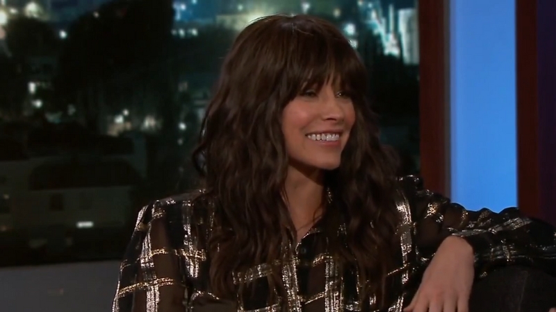 Evangeline Lilly sits smiling during a talk show interview