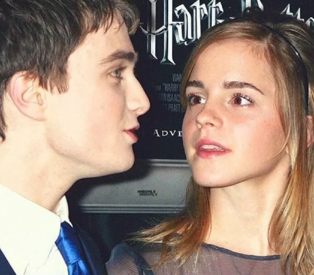 Young Daniel Radcliffe and Emma Watson at a Harry Potter event, standing close and talking