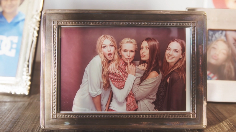 A framed photo of Gigi Hadid, Yolanda Hadid, Bella Hadid, and Alana Hadid posing together